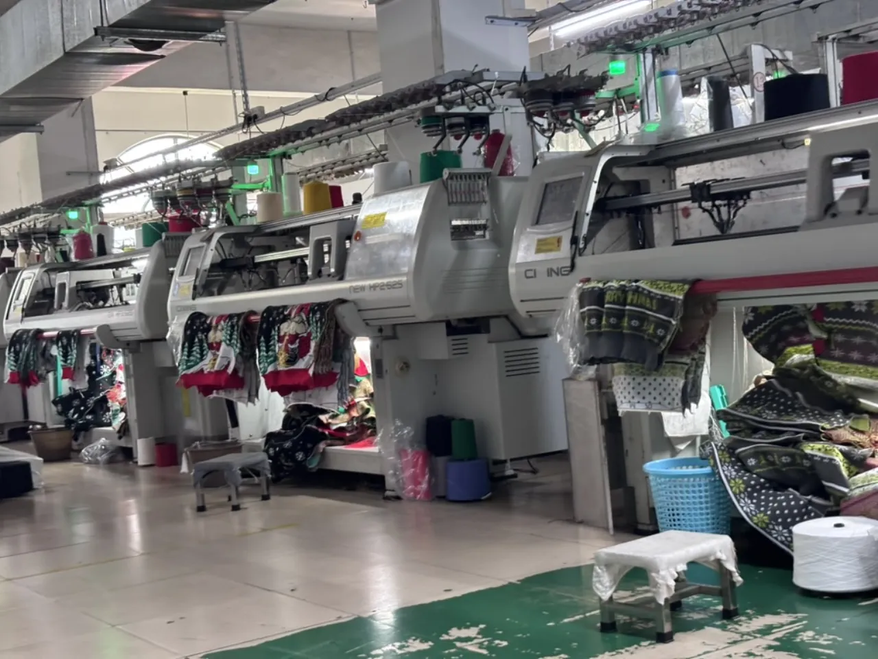 Bulk custom Christmas sweaters ready for delivery