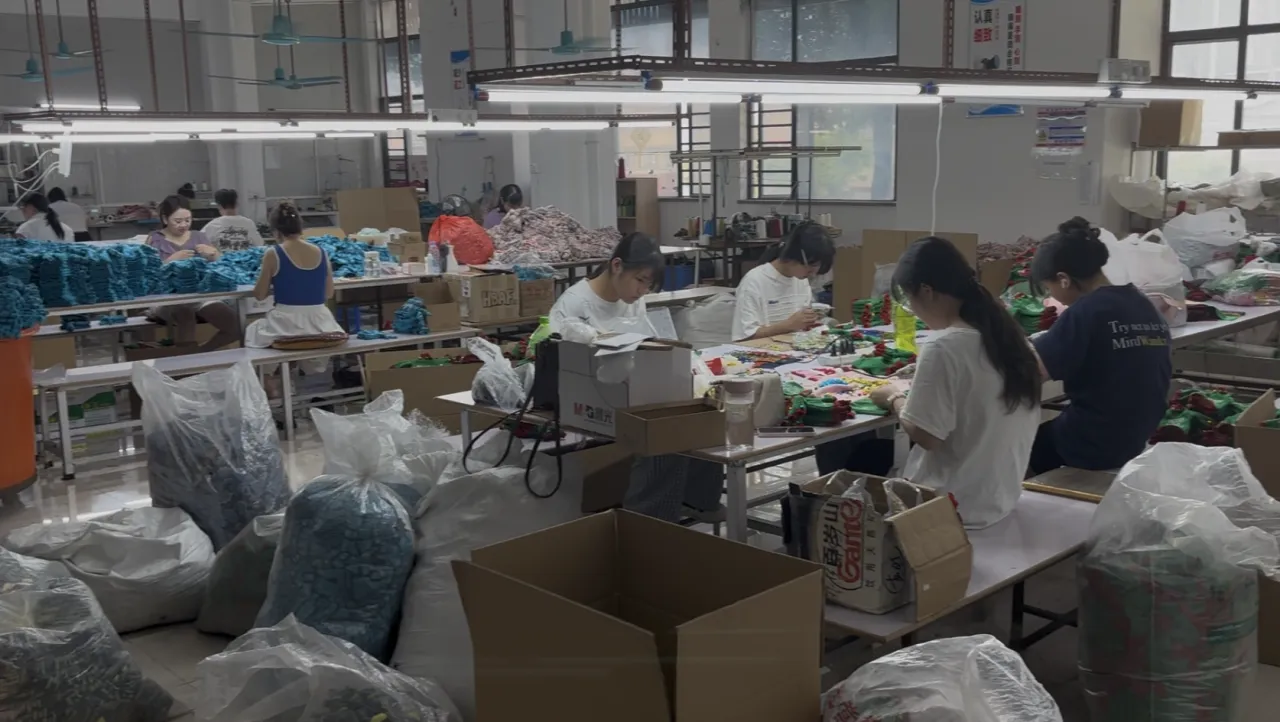 Computerized flat-knit machines on the Bente Dalang factory floor